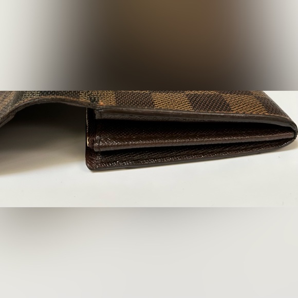 Authentic Louis Vuitton Damier Ebene Sarah wallet from 2005 in used condition. - Picture 13 of 15